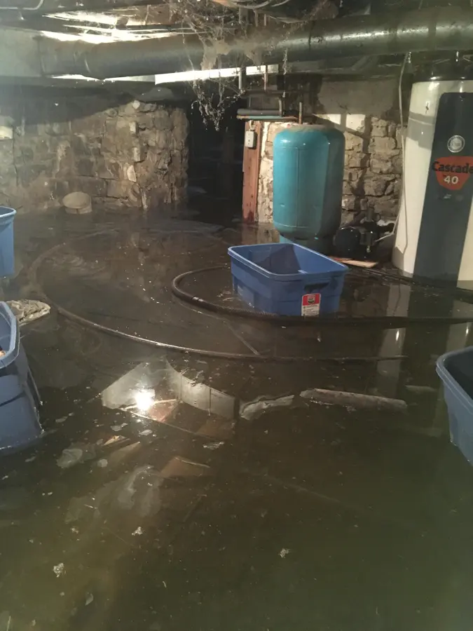 Water pooling in a flooded Antioch, IL basement